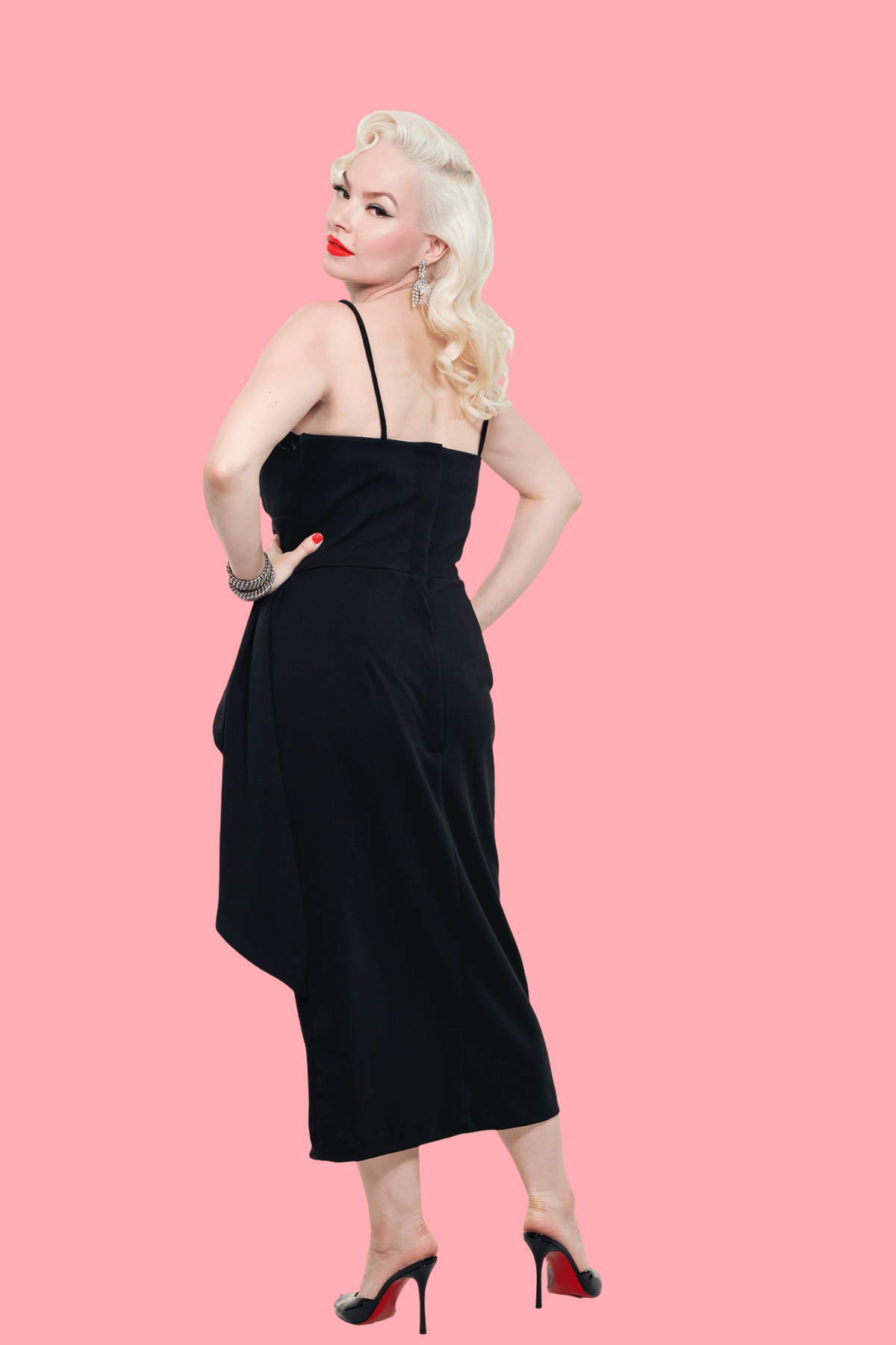 Black shimmering sarong dress by LadySplendorClothing, showcasing flowing fabric and elegant drape.