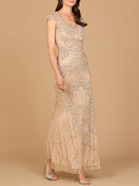 Lara New York beaded cap sleeve gown in nude, elegant formal dress with intricate beadwork and flowing fabric.