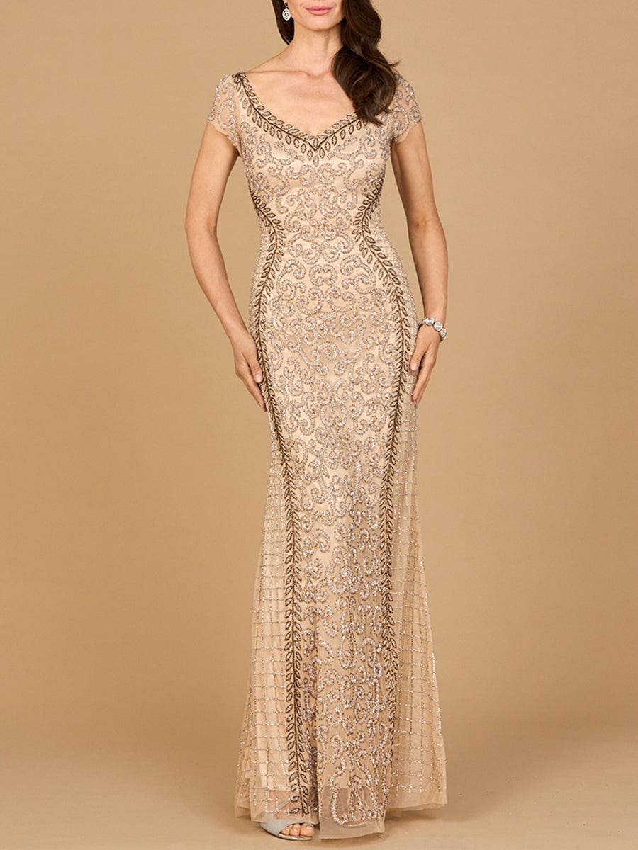 Beaded mermaid cap sleeve gown by Lara New York featuring nude color, intricate beadwork, and elegant fitted silhouette.