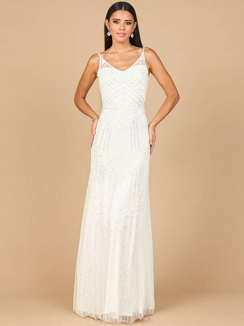 Ivory beaded gown with a cowl back by Lara New York, elegant evening dress featuring intricate beadwork and flowing design.