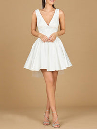 Ivory V-neck A-line bridal short dress by Lara New York with matching veil, shown on a model.