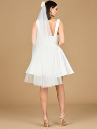 Ivory V-neck A-line bridal short dress by Lara New York with matching veil, displayed on a mannequin.