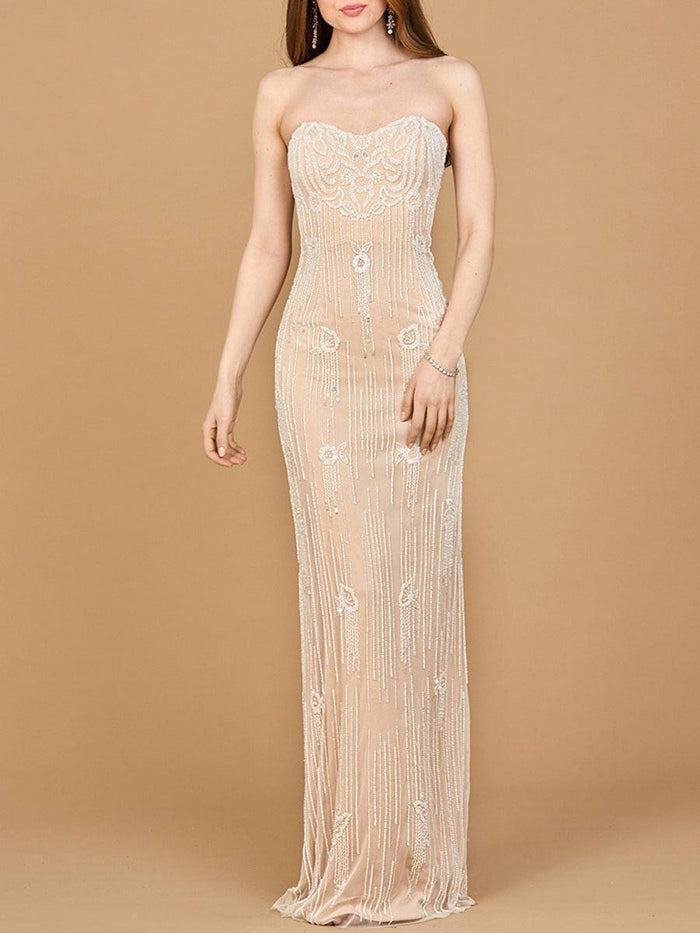 Lara New York strapless beaded wedding gown in nude ivory with intricate beadwork, shown on a dress form.