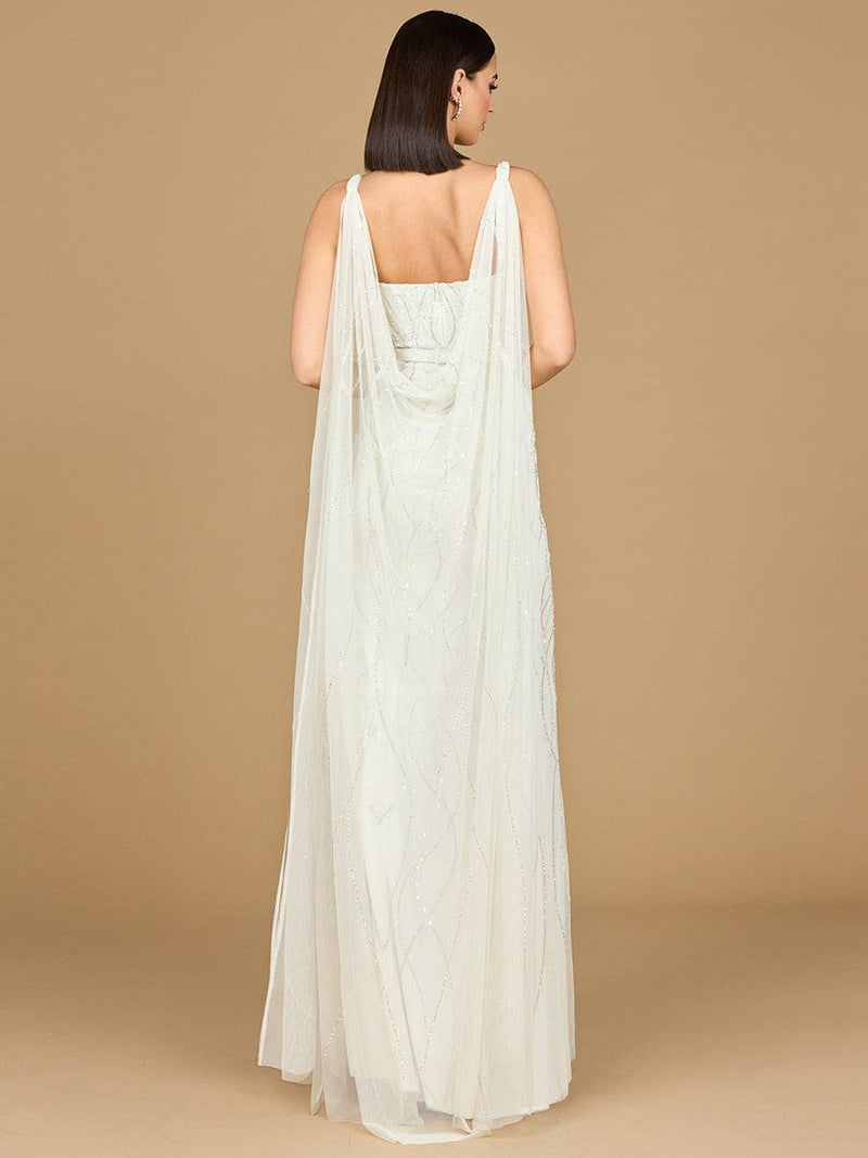 Beaded ivory wedding gown with cape by Lara New York, featuring intricate beading and elegant cape detail.
