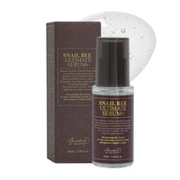 Benton Snail Bee Ultimate Serum Plus in a glass bottle with dropper, featuring a clear serum inside, designed for skincare.