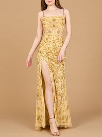Gold beaded corset gown with slit, elegant dress by Lara New York, featuring intricate beadwork and a flowing silhouette.