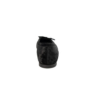 Black velvet handbag by Menina Step, handcrafted in Spain, featuring a sleek design and elegant texture.