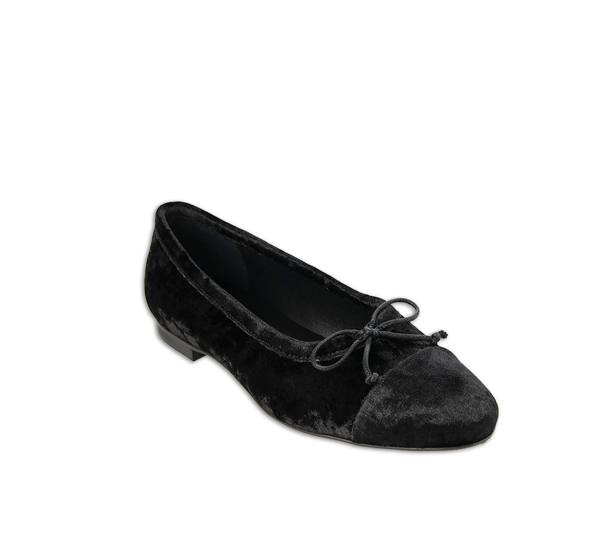Close-up of Menina Step Amelie Black Velvet shoe showing the soft velvet texture and elegant design.