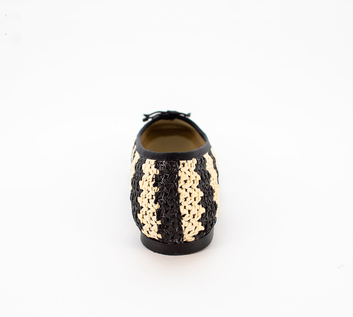 Handmade Menina Step Brive Raffia hat with wide brim and natural raffia material, crafted in Spain.