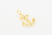 14K gold-filled anchor cross pendant with cubic zirconia, jewelry for men and women by JB Jewelry BLVD, shown in close-up image.