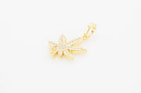 Gold-filled cannabis leaf pendant with cubic zirconia from JB Jewelry BLVD, elegant women’s fashion jewelry accessory.