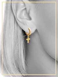 14K gold-plated silver cross pendant huggie hoops with cubic zirconia stones, black earrings featuring stylish jewelry design.