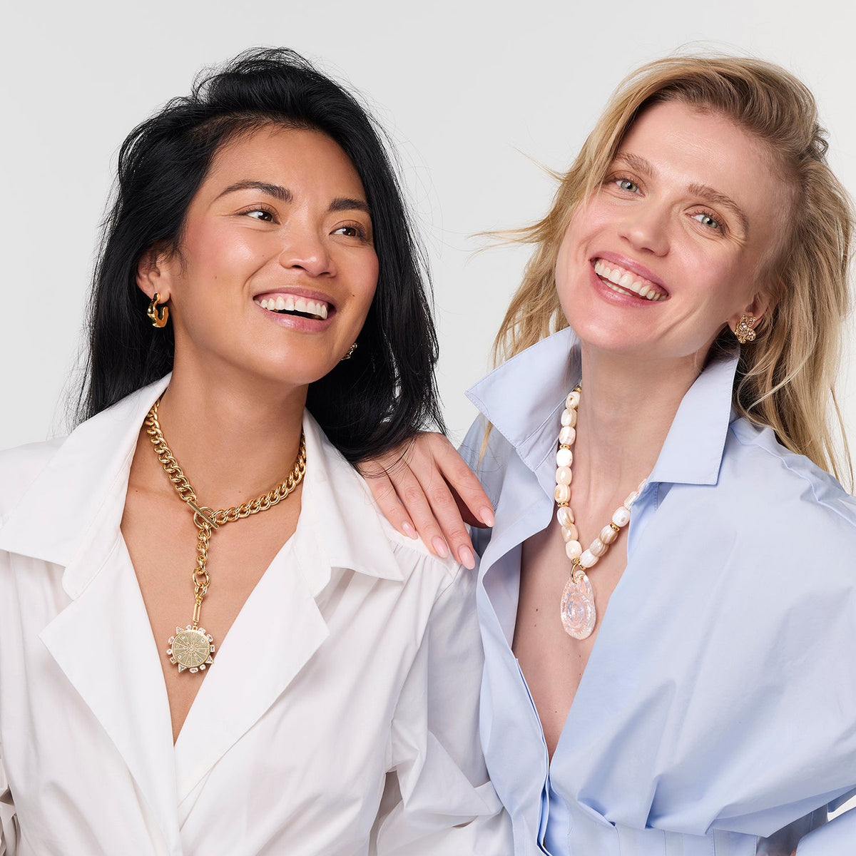 Mignonne Gavigan Odyssey necklace featuring a blue and gold pendant on a delicate chain, showcasing elegant jewelry design.