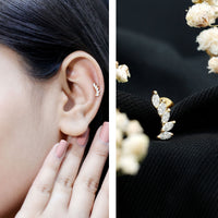 Marquise diamond crawler earring by Rosec Jewels for helix piercing, featuring sparkling diamond accents on body jewelry.