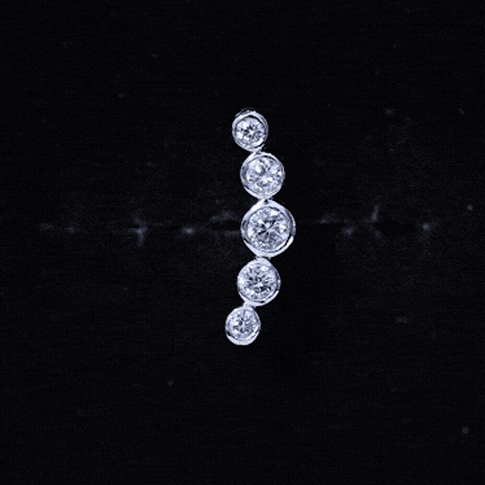 Graduated style diamond crawler earring for helix piercing by Rosec Jewels, featuring sparkling diamonds and gold-tone body jewelry