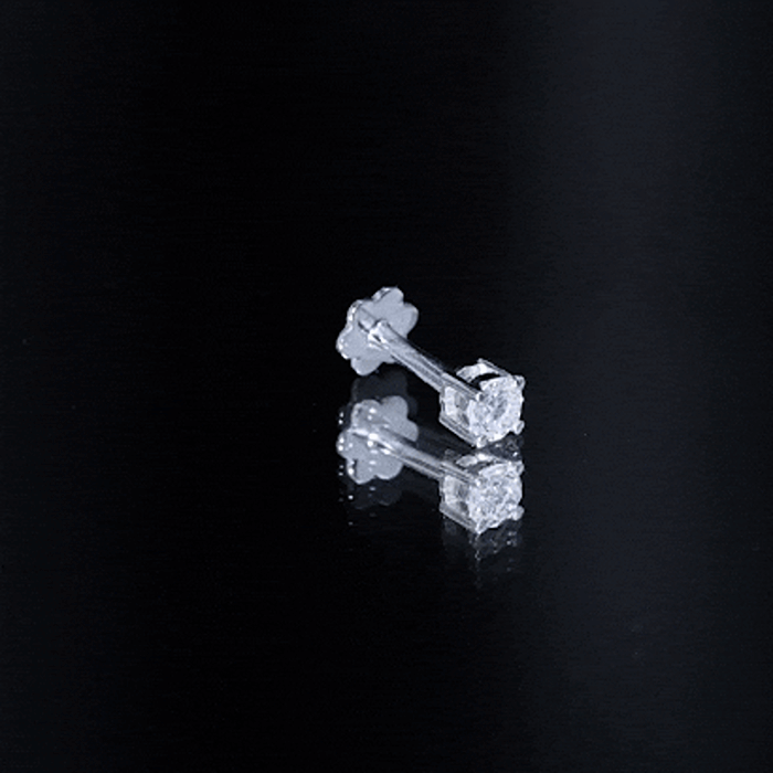Yellow minimalist diamond solitaire earring for tragus piercing, body jewelry by Rosec Jewels, featuring a sleek design and sparkling gemstone.