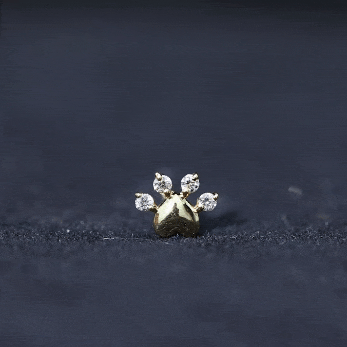 Yellow diamond and heart-shaped paw print cartilage earring by Rosec Jewels, body jewelry for pierced ears.
