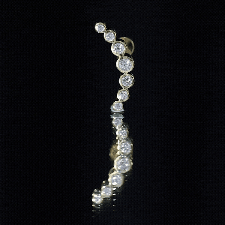 Yellow graduated diamond crawler helix earring in bezel setting, body jewelry by Rosec Jewels with sparkling diamond details.