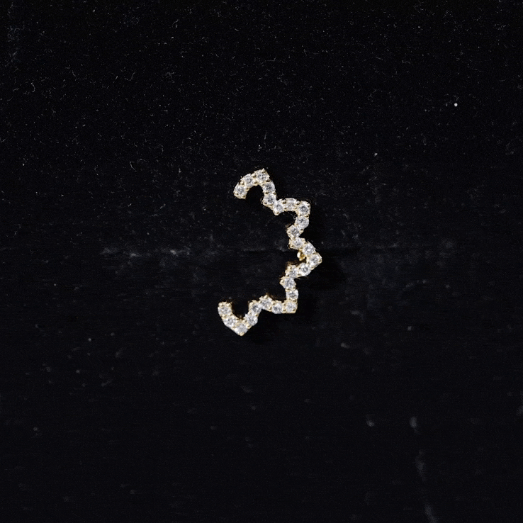 Yellow gold diamond curved floral earring by Rosec Jewels, body jewelry designed for cartilage piercing with floral detailing.