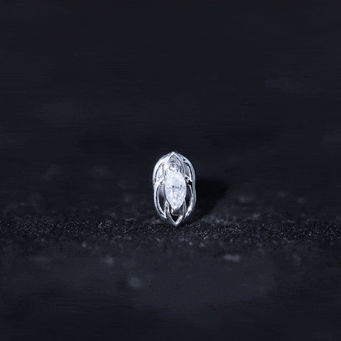 Yellow marquise diamond solitaire cartilage earring from Rosec Jewels, showcasing elegant body jewelry with a sparkling gemstone.
