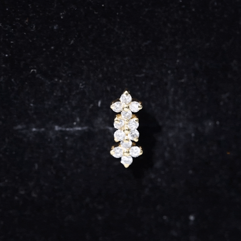 Yellow diamond flower crawler earring for helix piercing, Rosec Jewels body jewelry with sparkling gemstones and intricate floral design.