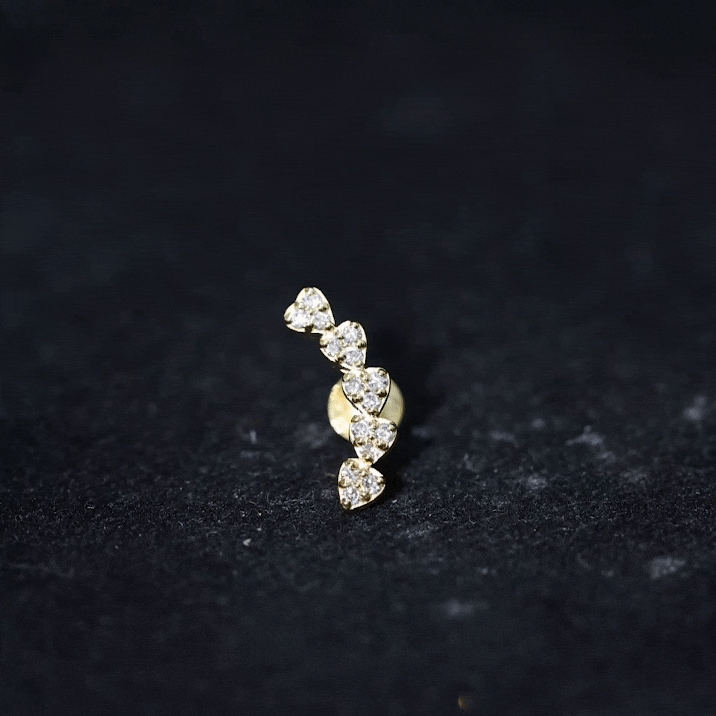 Yellow gold diamond heart crawler earring for helix piercing, body jewelry by Rosec Jewels featuring sparkling diamond accents.