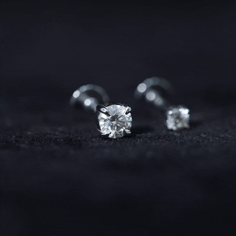 Brilliant cut diamond solitaire helix earrings by Rosec Jewels, showcasing elegant yellow diamond body jewelry for piercing adornment.