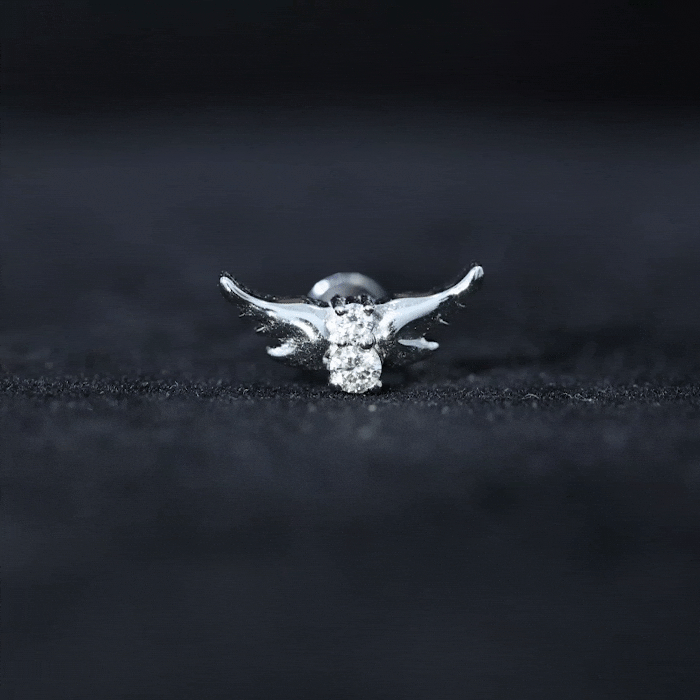 Yellow diamond bird helix earring by Rosec Jewels, animal-inspired body jewelry featuring a detailed bird design.