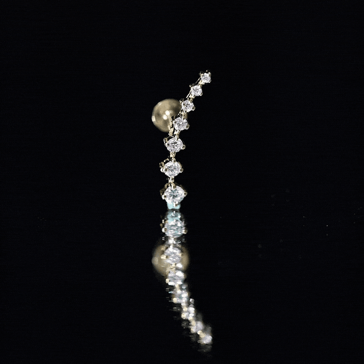 Yellow brilliant cut diamond helix ear climber earring by Rosec Jewels, showcasing sparkling diamonds in a stylish body jewelry design.