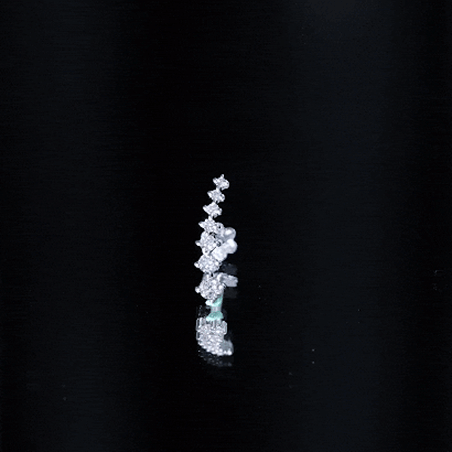 Yellow diamond ear climber earring from Rosec Jewels, graduated style body jewelry showing a sleek, curved design in the image.