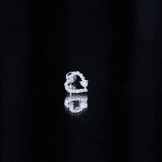 Yellow diamond heart-shaped cartilage earring by Rosec Jewels, elegant body jewelry with sparkling gemstone detail.