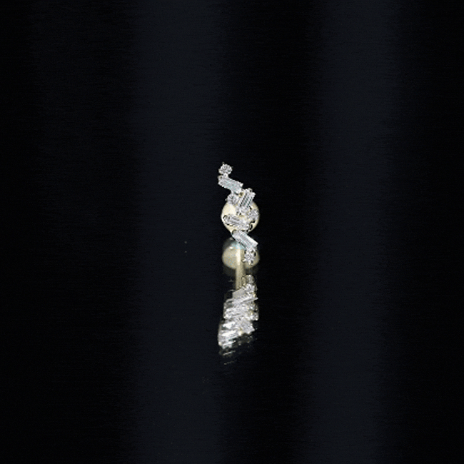 Yellow baguette diamond cartilage earring with flat back, body jewelry by Rosec Jewels showing a close-up of the jewelry piece.