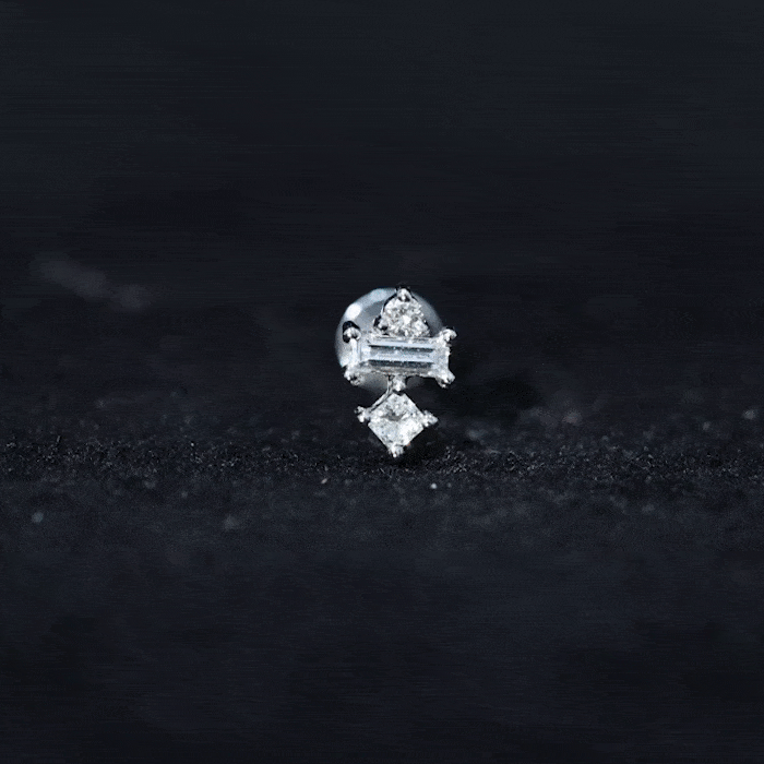 Genuine diamond three-stone tragus earring from Rosec Jewels, body jewelry with sparkling yellow diamonds and a sleek design.