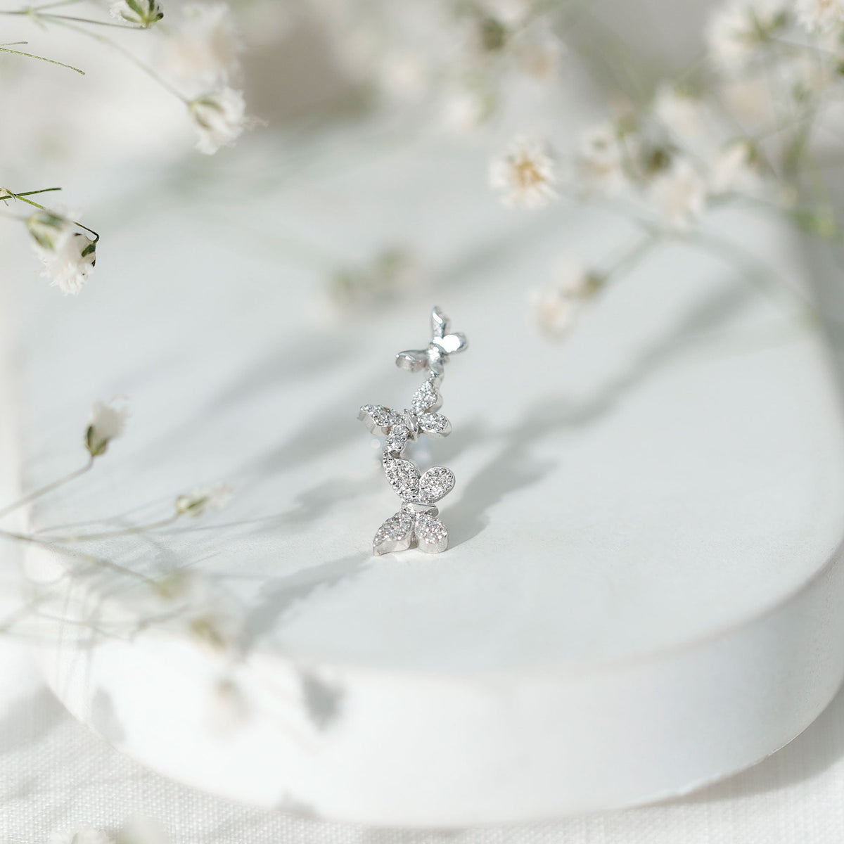 Moissanite butterfly climber earring for helix piercing, Rosec Jewels body jewelry with sparkling gemstone detail.