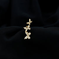 Moissanite butterfly climber earring for helix piercing, rose gold body jewelry with sparkling gemstone accents.