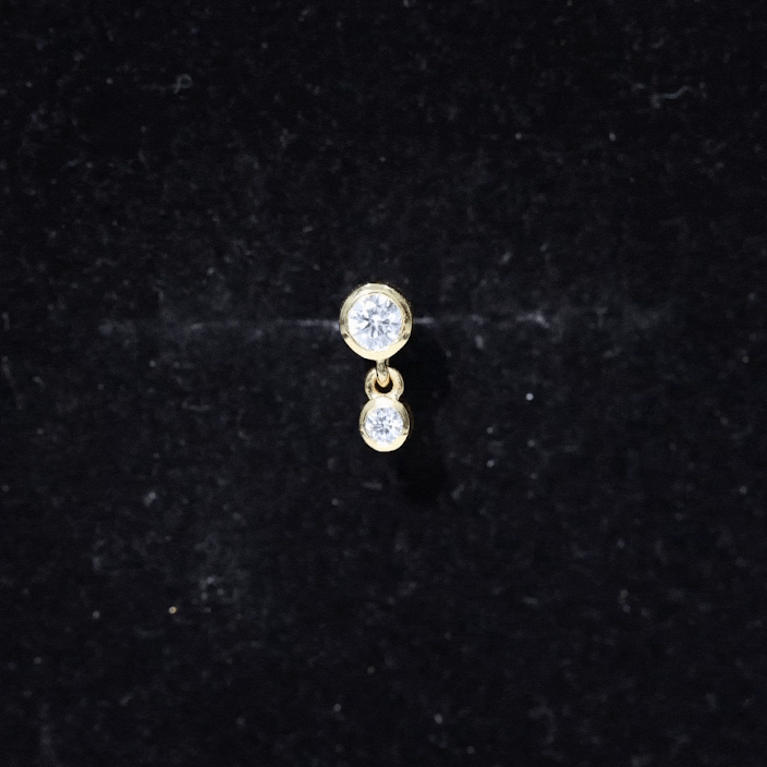 Yellow bezel-set round diamond helix drop earring, Rosec Jewels body jewelry featuring a sparkling diamond design.