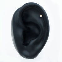 Dainty Round Diamond Conch Earring in Prong Setting