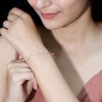 Certified diamond heart chain bracelet by Rosec Jewels featuring a prong setting with sparkling diamonds.