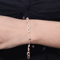 Yellow cubic zirconia infinity station chain bracelet by Rosec Jewels featuring sparkling zirconia accents and a delicate chain design.