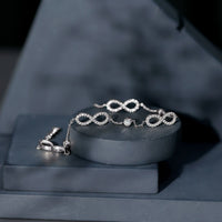 Rosec Jewels cubic zirconia infinity station chain bracelet with sparkling zirconia stones and delicate link design.