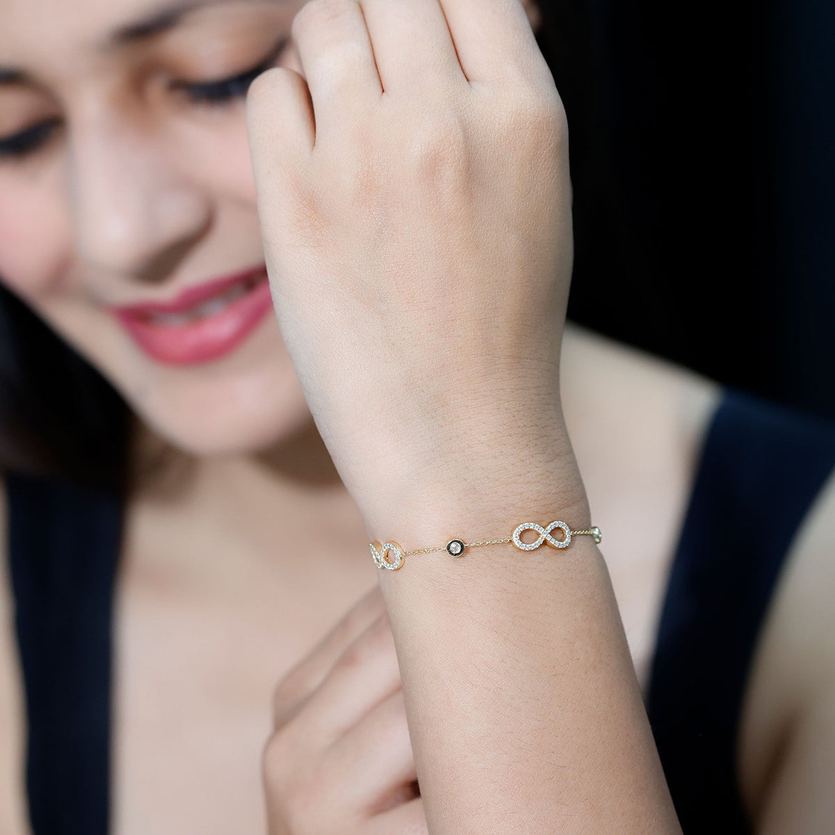 Cubic zirconia infinity station chain bracelet by Rosec Jewels with sparkling zirconia accents and a delicate linked design
