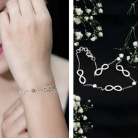 Certified Moissanite infinity chain bracelet by Rosec Jewels featuring sparkling moissanite stones and a delicate infinity design.
