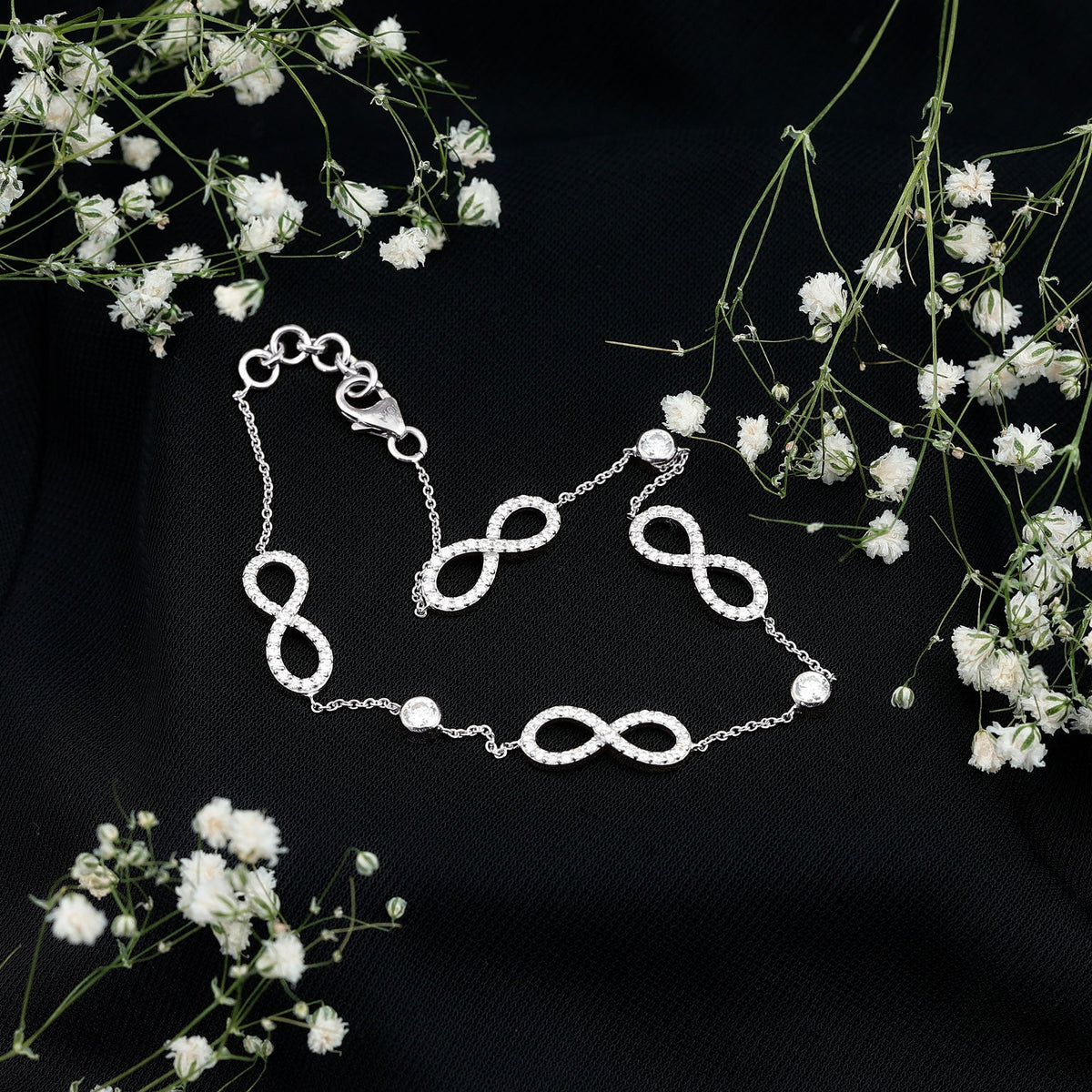 Rosec Jewels Certified Moissanite Infinity Chain Bracelet featuring sparkling moissanite stones on a delicate gold chain