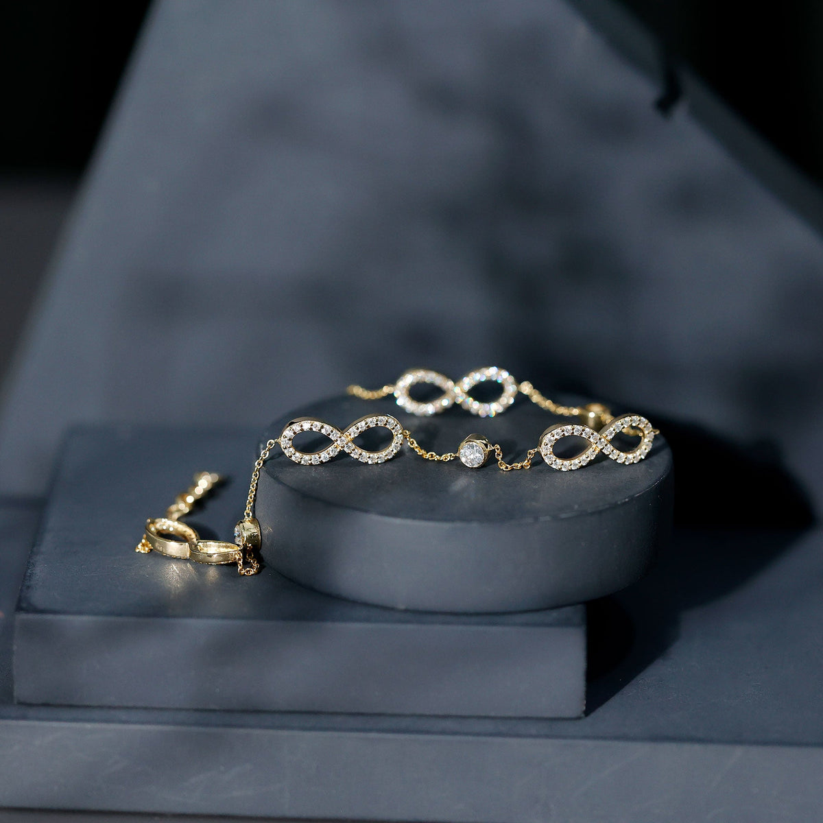Rosec Jewels certified moissanite infinity chain bracelet with sparkling stones and delicate design.
