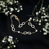 Rosec Jewels Certified Moissanite infinity chain bracelet with sparkling moissanite stones and silver-tone metal links.