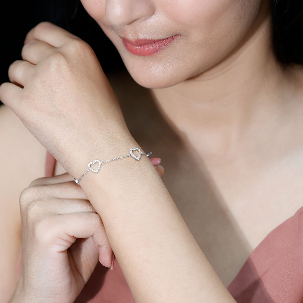 Certified diamond heart chain bracelet in prong setting by Rosec Jewels featuring sparkling diamonds on a delicate chain.