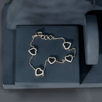 Certified diamond heart chain bracelet in prong setting by Rosec Jewels, featuring sparkling diamonds on a delicate chain.