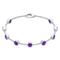 Bezel set amethyst station chain bracelet for women by Rosec Jewels featuring purple gemstones and a delicate gold chain.