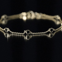 Natural black spinel 7-stone station chain bracelet by Rosec Jewels, featuring alternating black gemstones on a delicate chain.