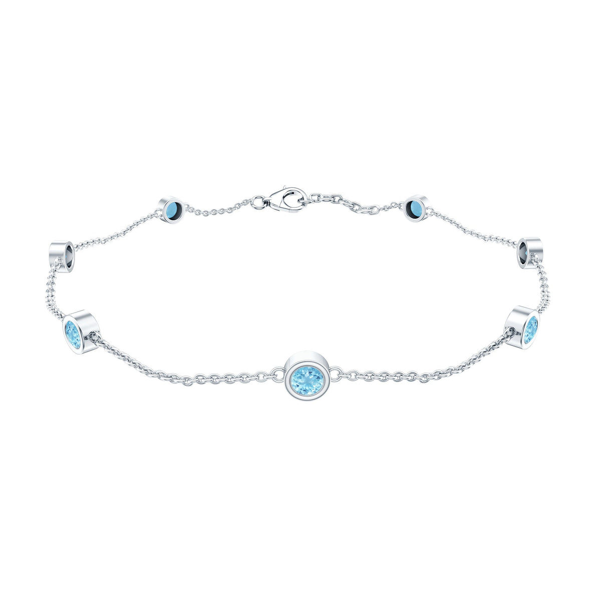 Bezel set aquamarine station bracelet for women by Rosec Jewels featuring oval aquamarine stones on a delicate silver chain.